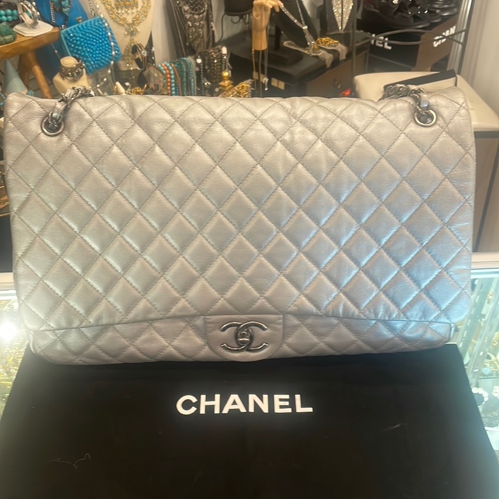 Chanel silver XXL travel bag